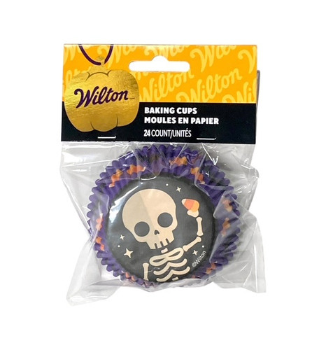 Skeleton Baking Cups. These black and purple paper baking cups feature a cute skeleton holding a candy corn on the bottom, with a pattern of candy corn and bats on the side. Package includes 24 count 2in baking cups.