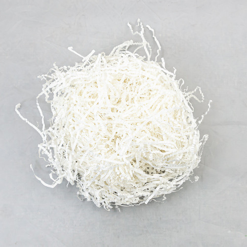 White Paper Shred. This classic shred features crinkled up strands of white paper. Great for filling gift bags and more! Net WT 2oz.