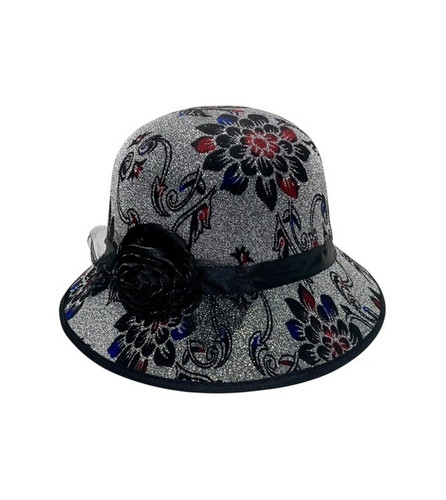 Floral Cloche Hat. This shiny silver hat has an intricate pattern of black flowers with touches of red and blue, along with a black ribbon band, black trim, and a fabric rose accent. One size fits most adults and teens.