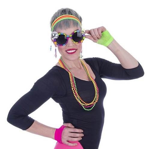 Neon Rock Star Kit. This kit includes sunglasses with colorful frames that have a silver disco ball on one side and colorful music notes on the other. It also includes neon yellow, orange, green, and pink hair ropes, matching plastic bead necklaces, cluster of stars earrings, and a pair of pink and green fingerless fishnet gloves. Glasses for novelty use only.