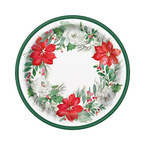 Traditional Christmas Dessert Plates. These lovely paper plates feature a white design with a green border, showcasing a wreath of red poinsettias, white flowers, red berries, and greenery. Package includes 8 count plates measuring 6.75in.