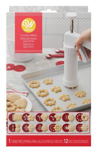 Christmas Cookie Press Set. This plastic press features a squeeze trigger and 12 assorted plastic discs for different designs. Hand wash only.