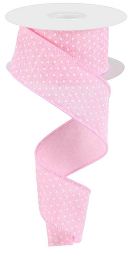 Light Pink Swiss Dot Ribbon. This light pink polyester ribbon features a pattern of raised white dots and matching pink borders. Measures 1.5in x 10yds.