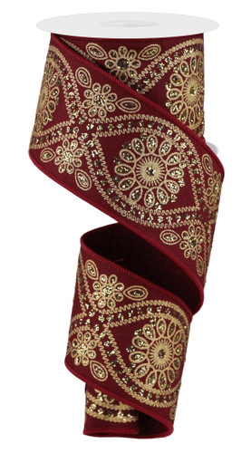 Deluxe Red & Gold Wavy Floral Ribbon. This wine red polyester ribbon features an intricate design of shimmery gold with matching red borders. Measures 2.5in x 10yds.