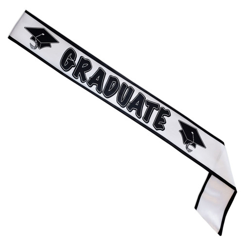 Graduate Satin Sash. This white satin sash with black borders features "GRADUATE" in black text with a black graduation cap on both sides. Measures 33 inches by 4 inches. One size fits most.