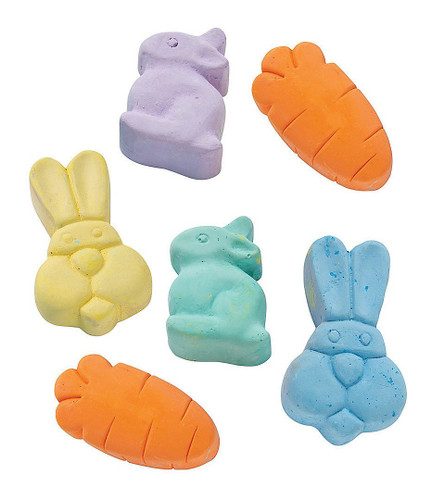 Easter Bunny Chalk Set. This set includes two bunny head shaped pieces of chalk in blue and yellow, two orange carrot shapes, and two bunny shapes in green and purple. Package includes 6 count pieces total measuring 3in.