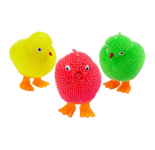 Mini Light Up Puffer Chick. Available in yellow, pink, or green, this puffer chick lights up when tossed against a surface. Batteries included. Desired color not guaranteed. Package includes 1 count toy measuring 2.25in x 2.75in.