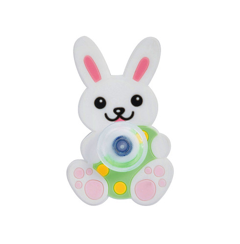 Easter Bunny Fidget Spinner. This plastic toy features a smiling white bunny holding a green Easter Egg with yellow spots. Measures 1.75in x 2.75in.