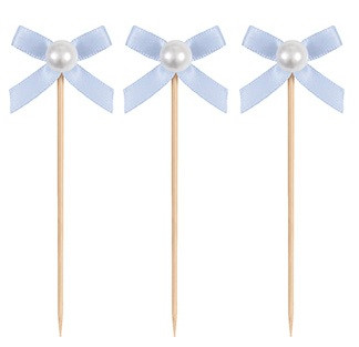 Dainty Bow Picks. These wooden picks feature a tiny light blue bow topper accented with a white plastic pearl. Package includes 15 count picks measuring 3.5in.