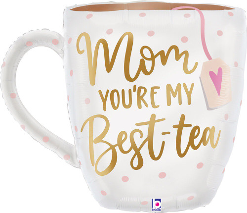Satin Best Tea Mom Balloon. This white mug shaped balloon features a pattern of pink dots around "Mom YOU'RE MY Best-tea" in gold text. Balloon is approximately 29 inches after inflation.