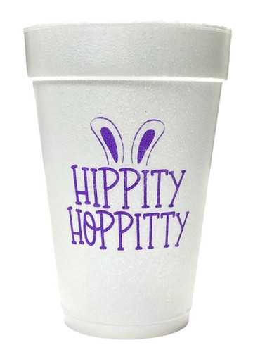 Hippity Hoppity Styrofoam Cups. 16 oz white Styrofoam Cups, featuring the text "HIPPITY HOPPITY" in purple ink, underneath a pair of bunny ears. Each sleeve includes 25 durable cups, perfect for hot or cold drinks at your event. Add a festive touch to your celebrations with these must-have cups.