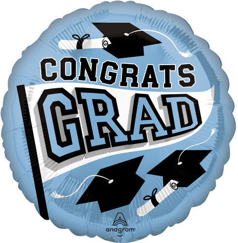 Light Blue Be True To Your School Grad Balloon. This light blue circular balloon features "CONGRATS" in black and "GRAD" in light blue with a black outline, displayed on a white flag design. Surrounding the flag are festive graduation caps and diplomas. Balloon is approximately 17 inches after inflation.