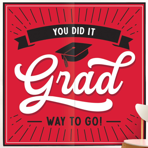 School Spirit Grad Backdrop - Red. Featuring a red background with a black border, this 2 piece plastic backdrop showcases "YOU DID IT" in white text on a black banner arched above a black grad cap and "Grad" in white script. "WAY TO GO!" sits at the bottom in black text. Each piece measures 32.5in x 65in. Measures 65in x 65in when pieced together.