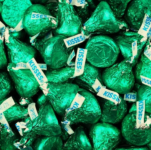 Green Hersheys Kisses. These classic milk chocolate kisses wrapped in green foil are a perfect addition to birthdays, holidays, showers, and more. Net weight 8 ounces.