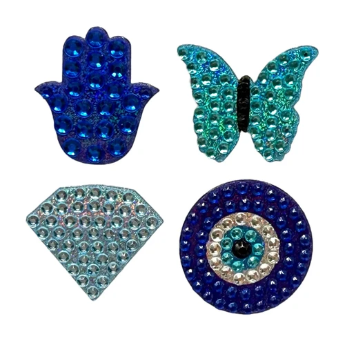 Stickerbeans Rhinestone Stickers - Saphire Baby Beans. These sparkly stickers feature a dark blue Hamsa, a light blue butterfly, a light blue diamond, and a multicolor blue bullseye. Package includes 4 count stickers measuring about .75in each.