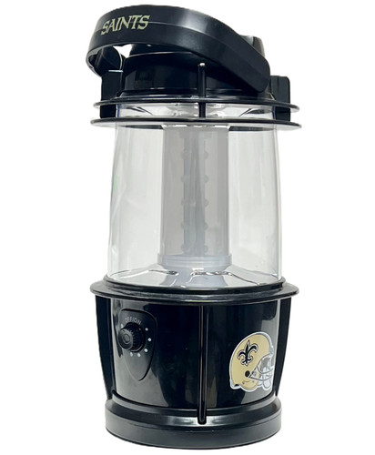 New Orleans Saints LED Lantern. This black plastic lantern features "SAINTS" in gold text across the handle and a gold Saints helmet on two sides of the base. Requires 3 count 1.5V D batteries, not included. Good for indoor or outdoor use, with 125 lumens. Measures 9in tall x 4.5in in diameter.