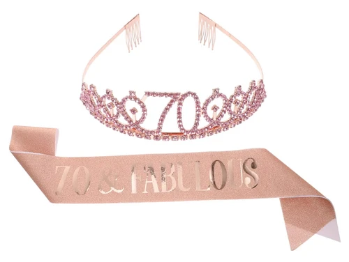 70 & Fabulous Crown & Sash Set. This rose gold tone crown with combs is decorated with tiny pink rhinestones and "70" along the top, and the glittery rose gold fabric sash features "70 & FABULOUS" in rose gold foil. Package includes 1 count crown, 1 count sash, and 1 count gold tone safety pin. One size fits most adults.