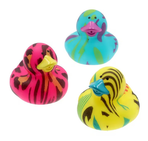 90s Rubber Duck. These little vinyl ducks feature a variety of bright colors and patterns in 90s style, including neon teal, yellow, and pink leopard. Duck will not float upright. Desired color and pattern not guaranteed. Actual layout of pattern will vary. Package includes 1 count duck measuring 2in.