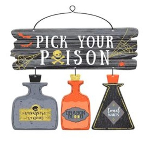 Pick Your Poison Hanging Decoration. This sign features a printed distressed wood panel with "PICK YOUR POISON" in white text, a skull and crossbones in place of the first "O" in "POISON," and also decorated with orange bats and yellow spiderwebs. Hanging from this panel are 3 flat bottle shapes in grey, orange, and black, with the labels "vampire venom," "DRAGON BLOOD," and "toad WARTS." Includes a wire hanger. Measures 11.25in x 13.5in.