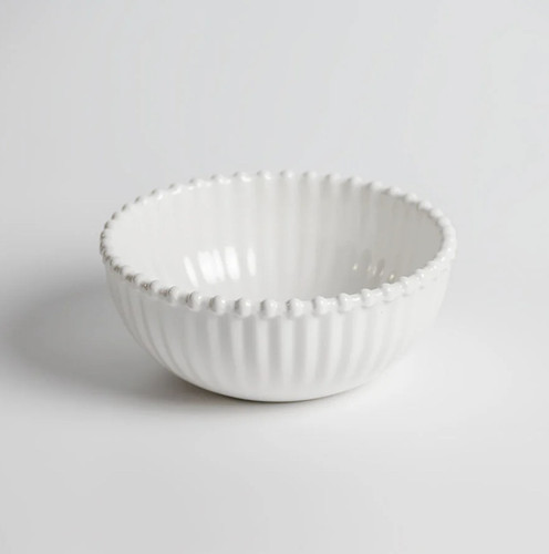 Beaded Pearl Melamine Bowl. This sturdy, reusable hard plastic bowl features a creamy white color with a beaded border and raised textured sides. Package includes 1 count bowl measuring about 6in in diameter and 2.3in tall.