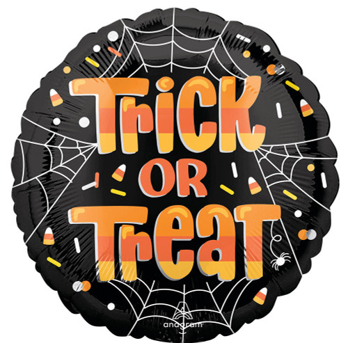 This black circular balloon features "Trick or Treat" in orange and yellow striped text, surrounded by sprinkles and candy corn as well as spider webs. Balloon is approximately 17 inches after inflation.