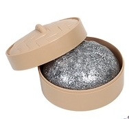 Glitter Squeezy Dumpling. Shaped like a round dumpling, this stress toy arrives in a mystery glittery color. Desired color not guaranteed, no returns or exchanges. Package includes 1 count toy measuring about 3.5in in a plastic steamer pot shaped container measuring 3.75in in diameter, 1.8in tall.