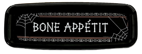 Bone Appetit Rectangular Plastic Serving Tray. This black, rectangular tray with rounded corners features the phrase "BONE APPÉTIT" in white bone shaped text, framed by skulls, spiderwebs, and orange lines. Measures 17.4in x 6.4in.