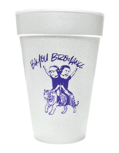 Bayou Bromance Styrofoam Cups. 16 oz white Styrofoam Cups, one side featuring two coaches sitting on a tiger underneath the text "BAYOU BROMANCE" and the other side with a football shape in a heartbeat scan between the lines of text "SAME SIDELINE SAME VIBES" all in purple ink. Each sleeve includes 25 durable cups, perfect for hot or cold drinks at your tailgate.