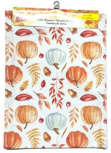 Harvest Printed Fabric Tablerunner - Pumpkins. This white cotton and polyester table runner is available in a print with pumpkins and/or colorful fall foliage. The underside is white. Desired style not guaranteed. Package includes 1 count runner, measuring 70in x 13in.