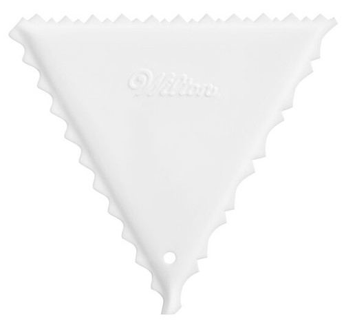 Decorating Triangle. This white, plastic triangle features three sides with different patterns to choose from for your cake's outer icing layer's finishing touch. Measures 5.5in x 5in.