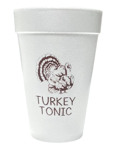 Turkey Tonic Styrofoam Cups. 16 oz white Styrofoam Cups, featuring the text "TURKEY TONIC" in capital text underneath a feathered turkey, all in brown ink. Each sleeve includes 25 durable cups, perfect for hot or cold drinks at your Thanksgiving gathering.