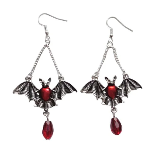 Jeweled Bat Earrings. These silver tone metal earrings feature bat shapes on tiny chains with outstretched wings and red bodies, a red acrylic gem dangling underneath. Package includes 1 count pair of earrings measuring about 2.5in long.