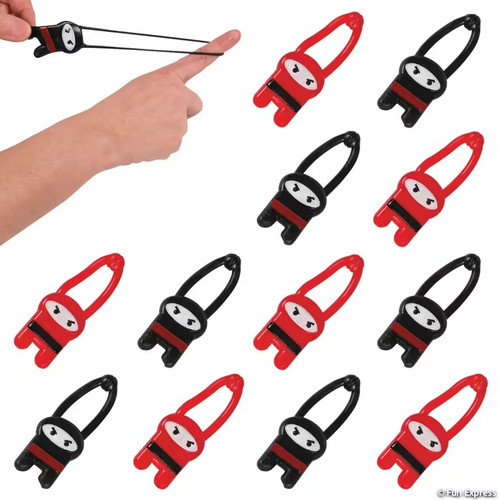 Stretchy Flying Ninjas. Simply pull it back from around the tip of your finger and watch it zoom. These vinyl ninjas dressed in red and black with alternating color belts and have tiny angry eyes. Package includes 12 count favors measuring 3.25in.