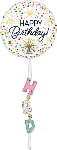 Airwalker Confetti Sprinkle Birthday Balloon. This DIY self-sealing balloon features a white circle containing "HAPPY Birthday!" in black text surrounded by gold starbursts and multicolor dot confetti. Instead of a ribbon string it has an airfill streamer with "HBD" in pink, white, and mint green, accented with multicolor dot confetti. Includes a straw for inflating. Measures 24in x 69in.