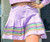 Adult Lavender Mardi Gras Skort. In soft lavender, it features shimmery sequin stripes in purple, green, and gold.