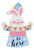 Easter Bunny Plaque. White bunny emerging from a blue gingham hat, holding a canvas banner with glitter and solid black text saying “Spring is Here.” Measures 15in x 11in.