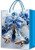 Blue Christmas Jumbo Gift Bag - bells. This paper bag features foil accents and light blue rope handles. Desired style not guaranteed. Measures 12.2in x 15.7in x 4.5in.