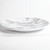 Melamine Marble Dinner Plate. This sturdy, reusable, slightly organically round, hard plastic plate features a white marble finish. Package includes 1 count plate measuring about 11in.