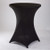 Black Spandex Round Cocktail Tablecover - 31in. Designed to fit snugly over smaller round cocktail tables and their legs, this stretch-fit cover stays in place and creates a stylish silhouette. Available in sizes that are ideal for a table 24in in diameter or 31in in diameter by 43in tall.