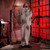 Standing Animated Light Up Psych Patient Halloween Decoration. Wearing a white polyester straitjacket and pants and black shoes, this plastic figure has a wrinkled white face, wild grey hair, and an open screaming mouth. When activated, it laughs and shakes its head side to side with light up red eyes. Requires 4 AA batteries (not included) and assembly. Dimensions: 5ft 6in x 15.75in.