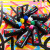 Cluster of POSCA PCM-22 MOP’R markers scattered artistically showing colour-coded caps
