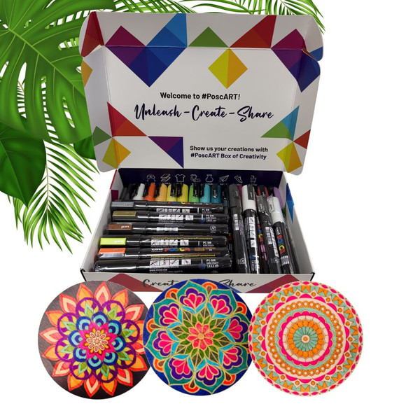 POSCART DIY bundle with 24 POSCA markers and 3 assorted decorated wooden mandalas in a branded gift box with tropical palm leaves