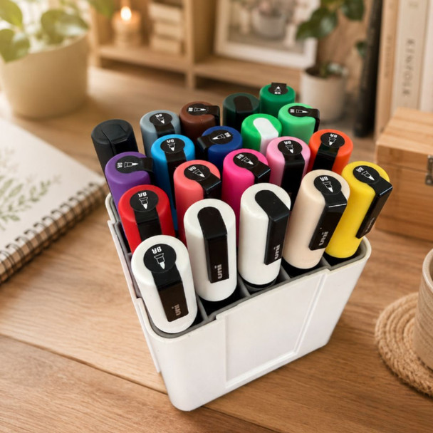 Deflecto Interlocking Marker Organiser with POSCA markers arranged neatly on a wooden desk in a lifestyle setting. | PoscART