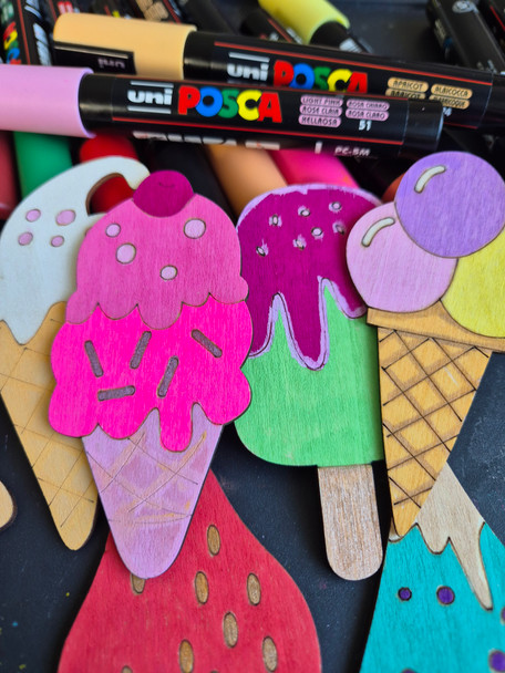 Kids decorating wooden ice cream cut-outs – fun DIY craft activity with colourful paints and creative designs. | PoscART