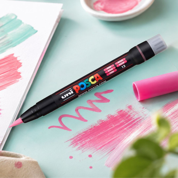 POSCA PCF-350 pink brush marker on a pastel creative workspace with pink swatches and brush strokes. | PoscART