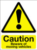 Caution beware of moving vehicles sign