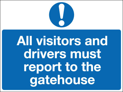 All visitors and drivers must report to the gatehouse sign