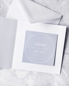Lagom gift card with envelope on marble background