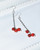 Lagom Cranberry Earrings Red front view on white dotted background