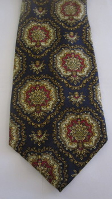 John Comfort navy tie with busy pattern